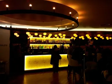 The yellow lighting of the bar area fits in well with the lemon thing they've got going on.