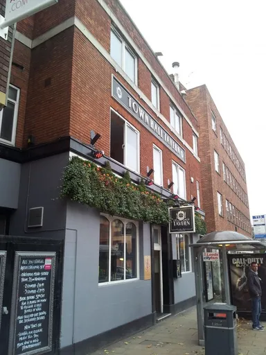 This gastropub sits diagonally opposite from the landmark it's named for.