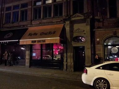 Neon Cactus hides behind this dirty orange awning.
