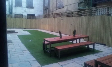 Here's the beer garden and a sneak peek of the mysterious yard.