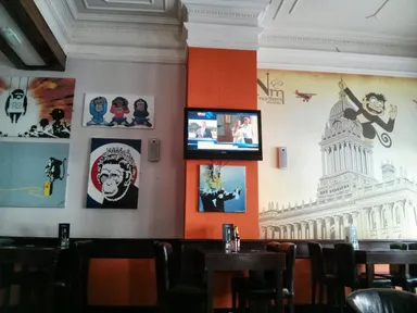 Some of the simian art adorning the walls.