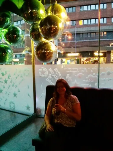 Sit under disco balls like a player.