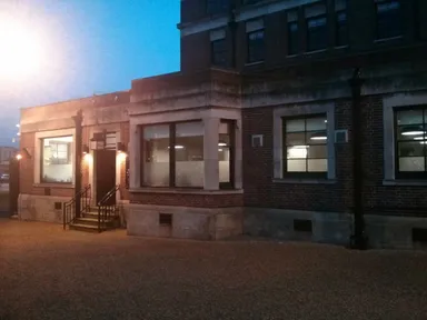 The slightly more humble actual entrance.