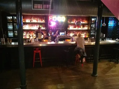 The bar. Don't ask what the bar staff are doing.