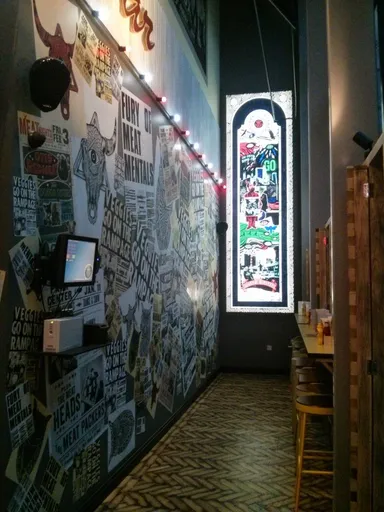 Of course it has a stained glass window. Of course it does.