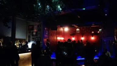 Looking across the dance floor to one of the stylish reserved tables.