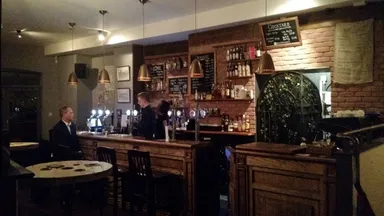 The upstairs bar is warm and welcoming.