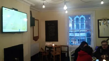 Sports upstairs. Not our thing, but also not distracting.