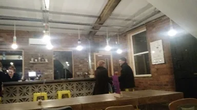 A rubbish photo of the bar and some of the furniture.