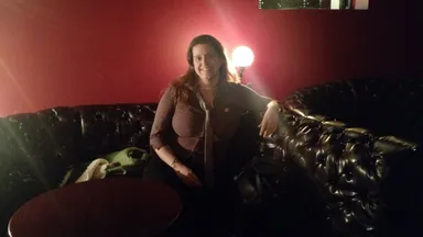 Here's Emily in a swanky booth.