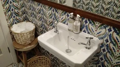 Inside a toilet cubicle. These toilets were so nice I had to photograph them.