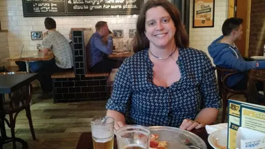 Emily doesn't look full after all that pizza. Good thing more is on the way!