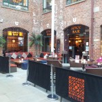 The bar's entrance and beer garden in The Electric Press courtyard.